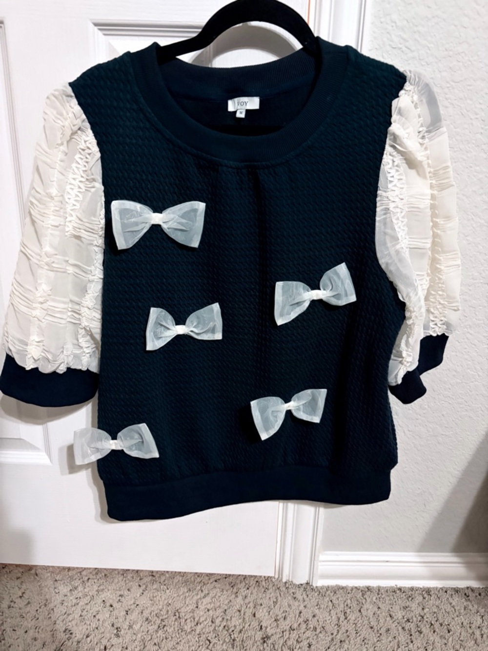 JOY Navy Sweater Top with Ivory Bow Accents